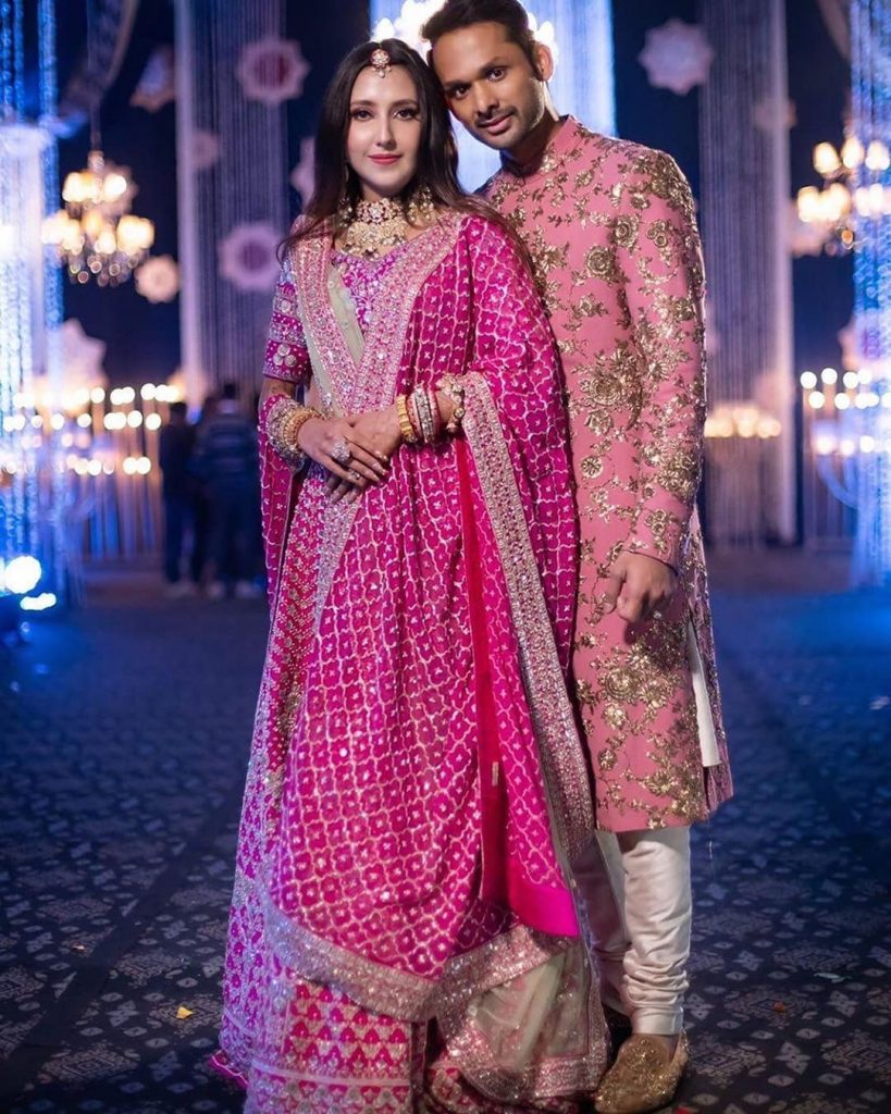 Groom in pink sherwani by Sabyasachi