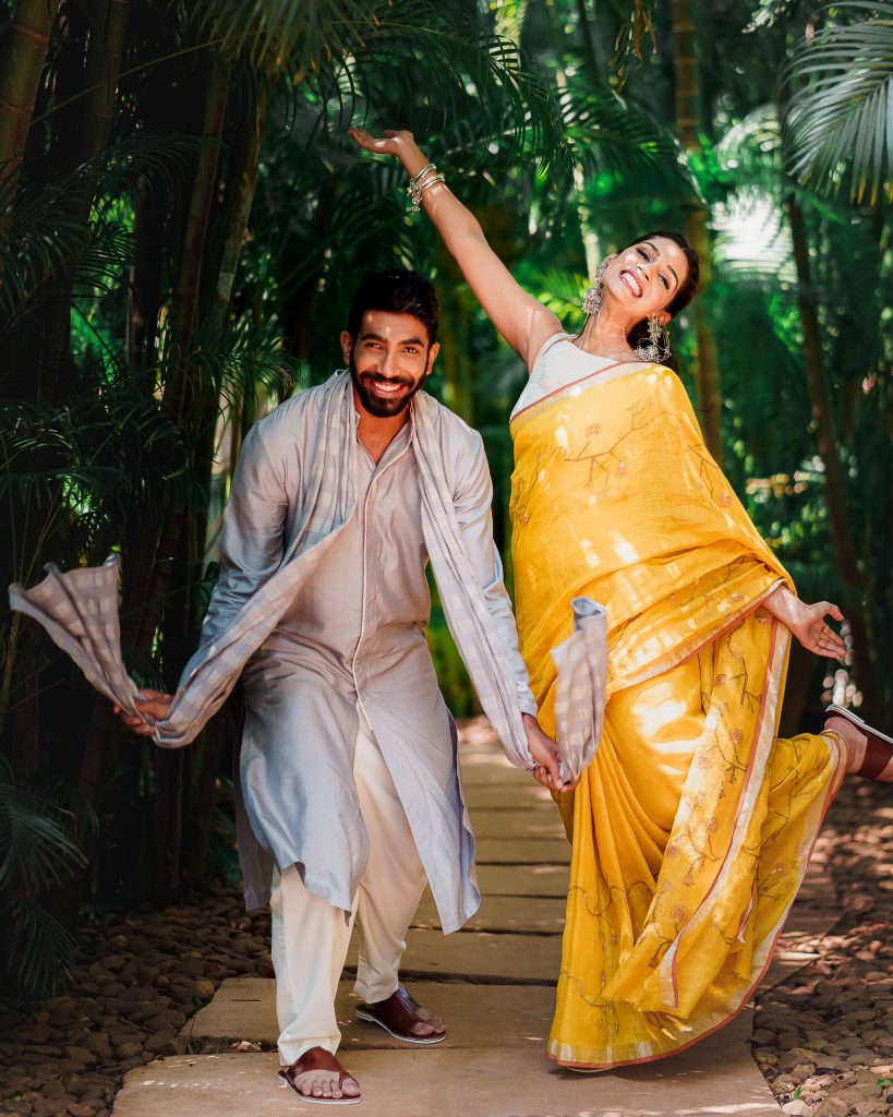 Jasprit Bumrah in Antar-Agni I Sanjana Ganesan in Anavila I Both wearing Aprajita Toor footwear for Haldi